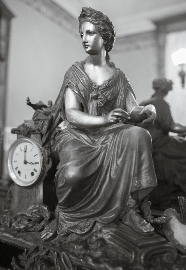 A Muse with a Clock by Susan C. Larkin